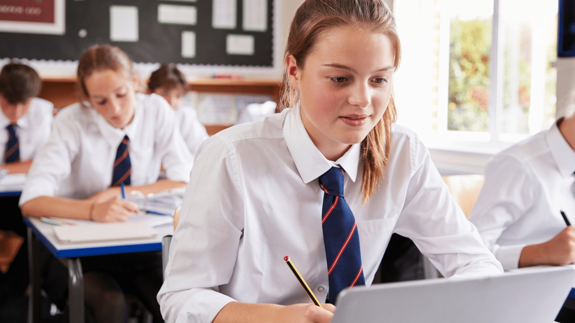 KS4 student using laptop