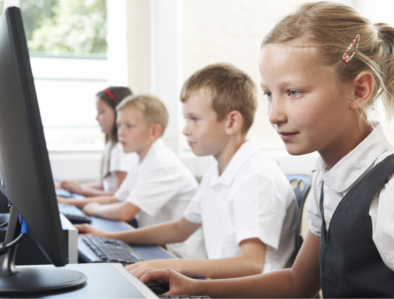 primary school aged children in computer lab