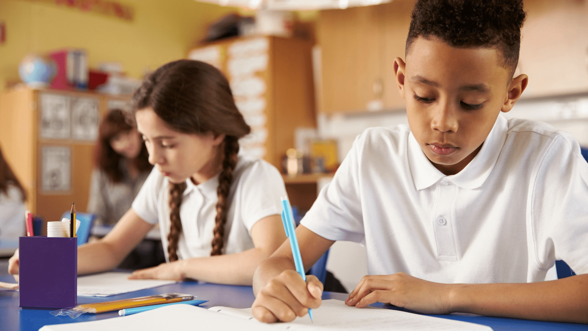 KS2 children working at desks